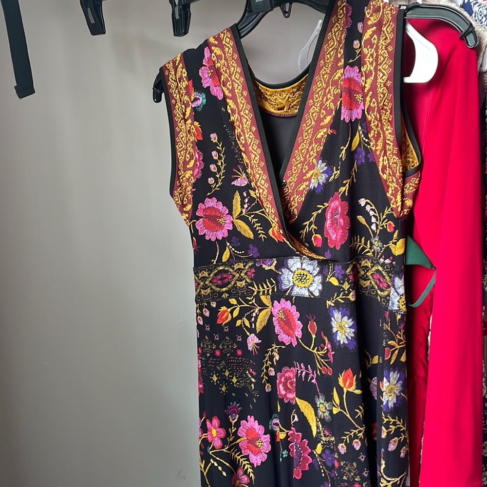 Gently worn fuzzy gorgeous  gown. Was very expensive but doesn’t fit me